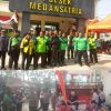 Polsek Medan Satria Bagikan Daging Kurban kepada Ojol dan Tukang Parkir di Hari Raya Idul Adha 1447 H